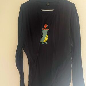 Selling Black Long-sleeve with a dinosaur.
